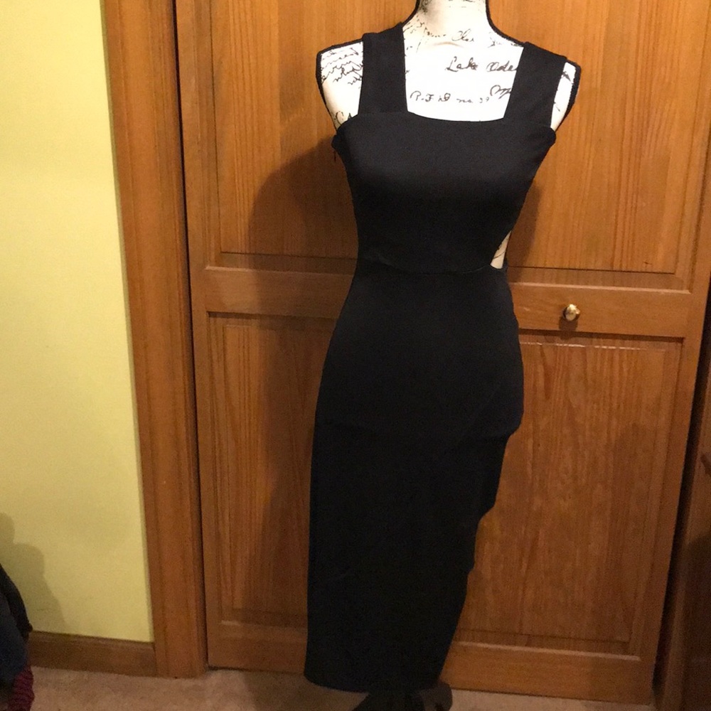 Sexy black midi cutout dress by Topshop. 💋